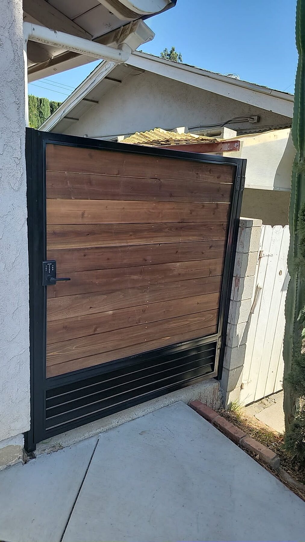 Wood and steel pedestrian gate
